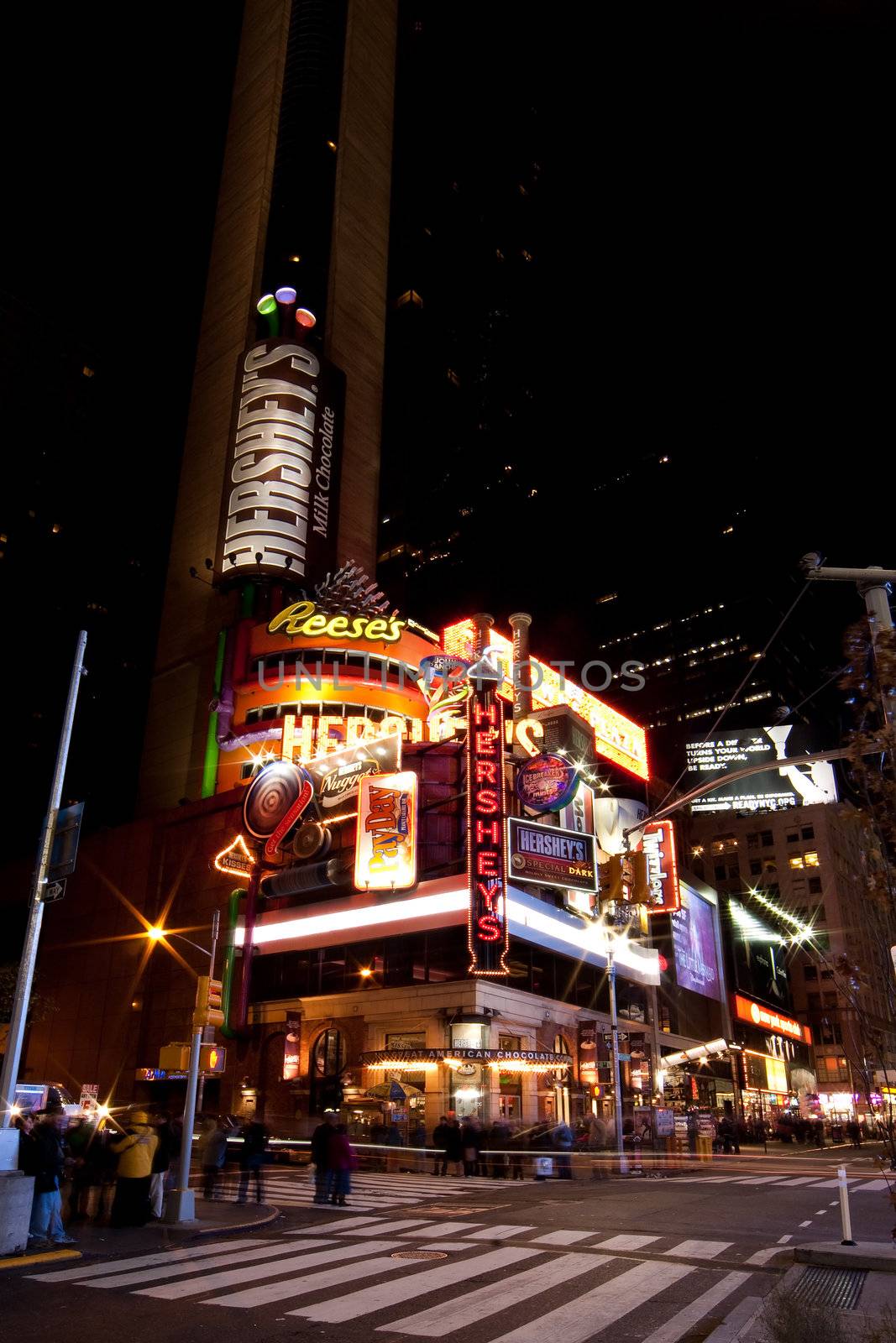 Hershey's, The Great American Chocolate Company, Candy store by night in Times Square, Manhattan, New York City.