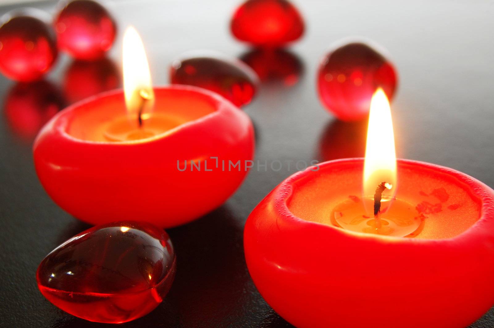 spa decoration with candles on black background