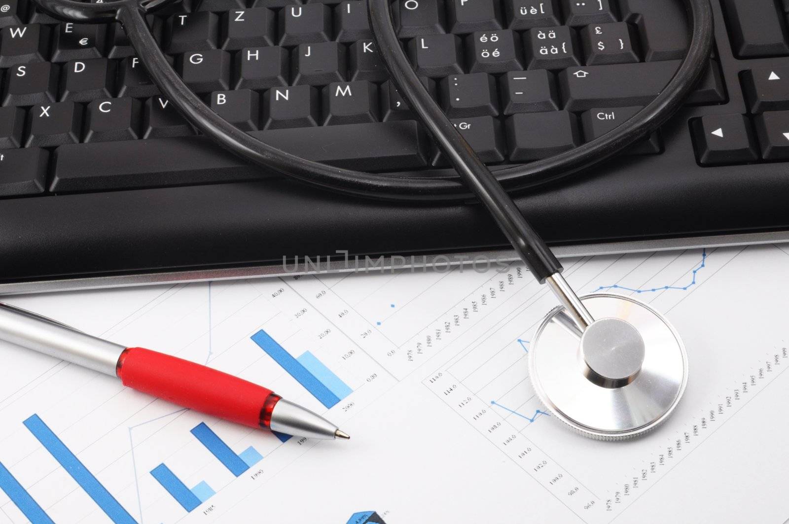 stethoscope computer keyboard and medical research data