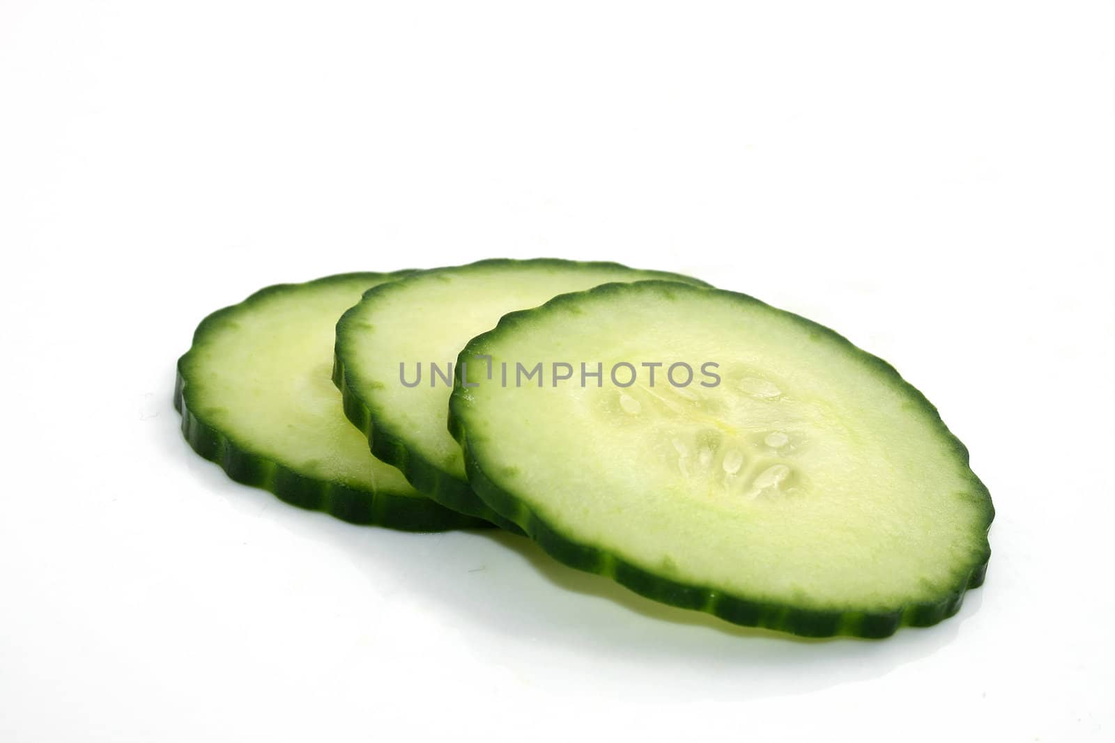 three cucumber slices by Brightdawn