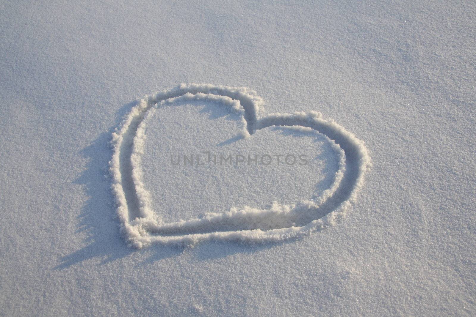 Heart painted on the snow