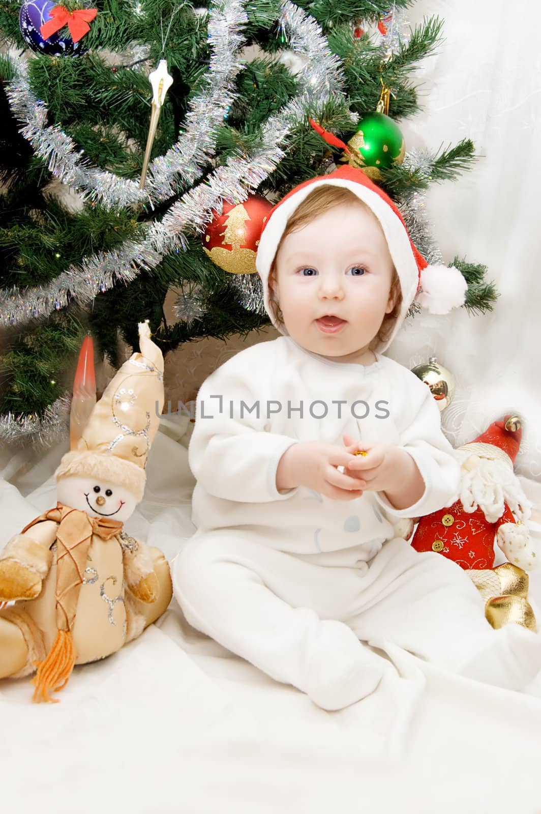 Sitting under Christmas tree by Angel_a