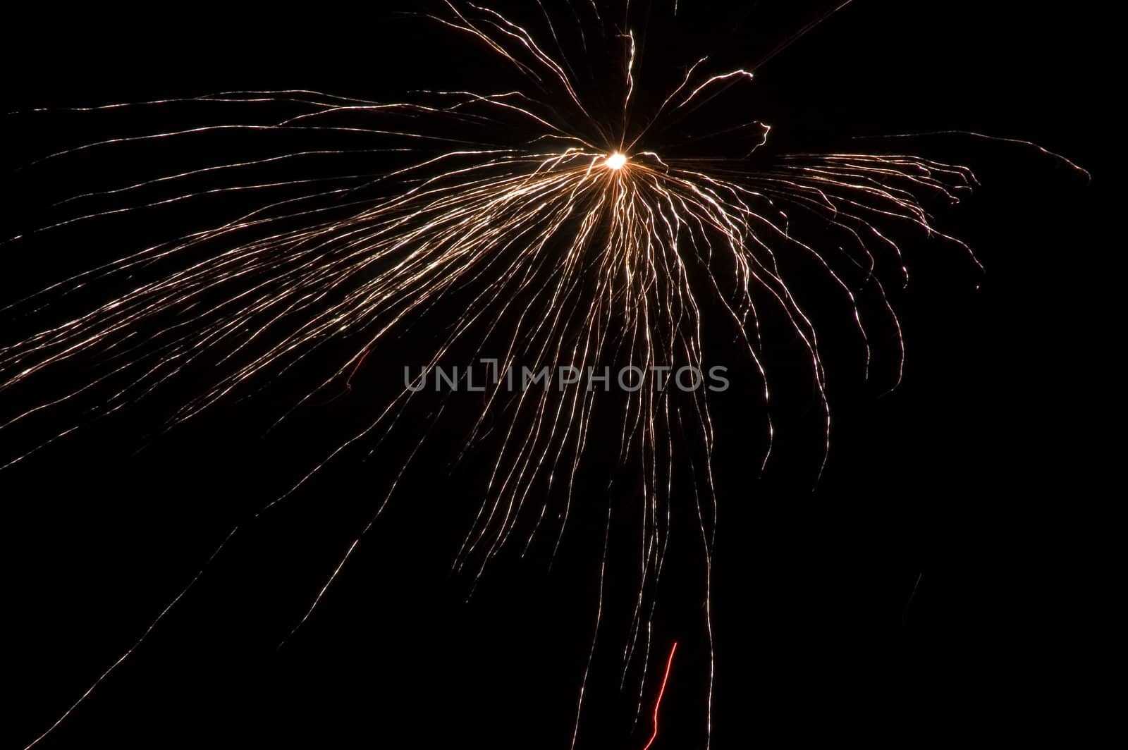 long exposure of multiple fireworks against a black sky by ladyminnie