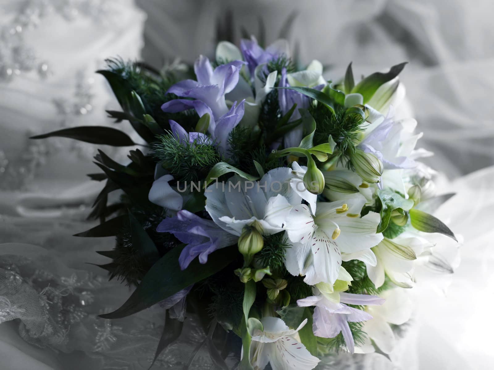 Wedding bouquet on a background of a dress