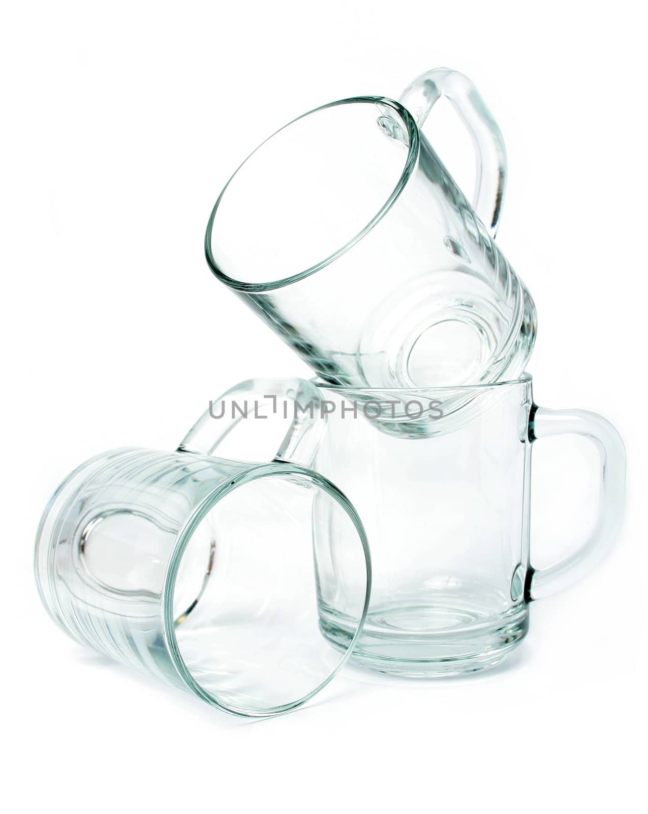 Three empty glass mugs, Isolated (look similar images in my portfolio)
