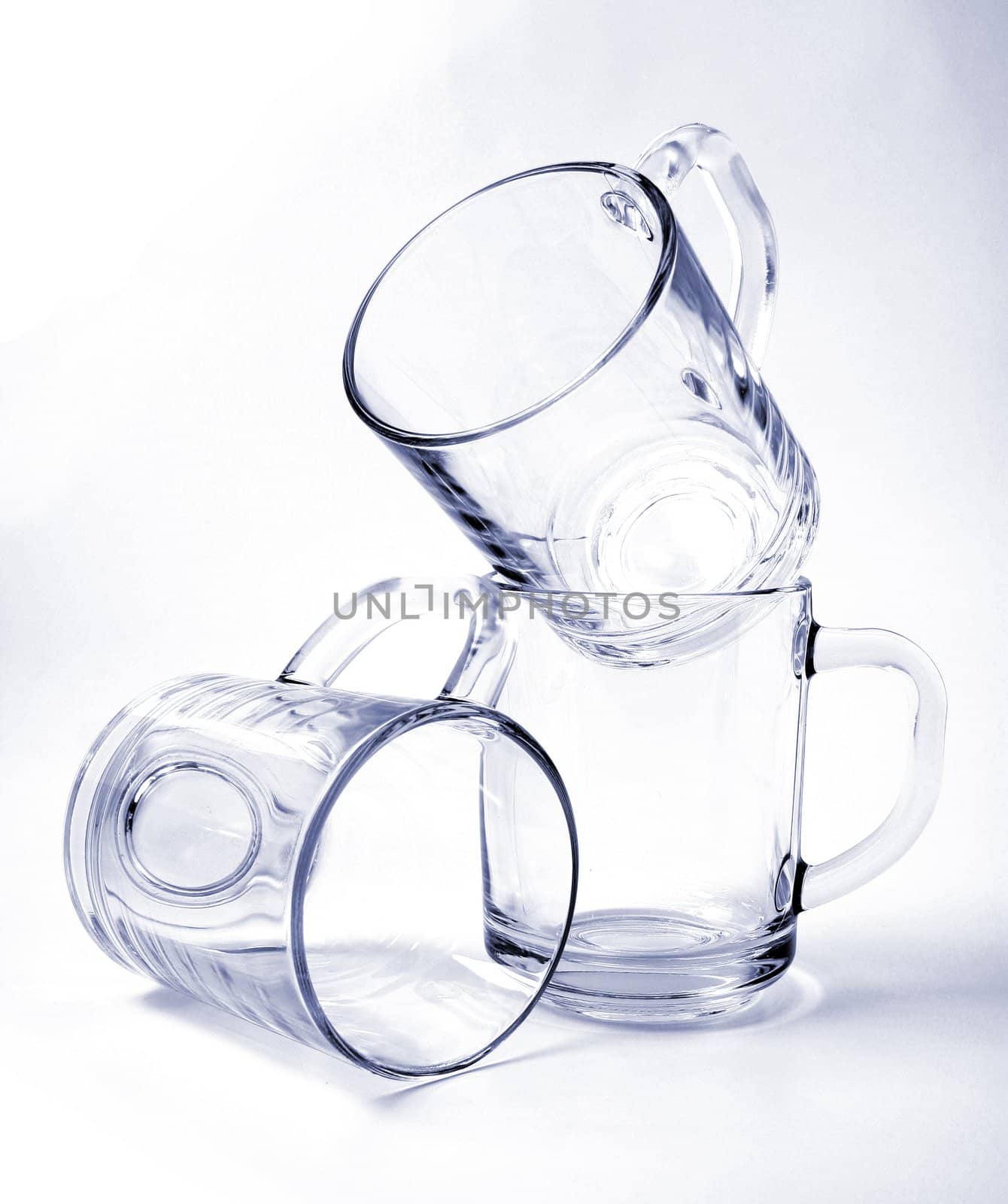 Three empty glass mugs, Isolated (look similar images in my portfolio)