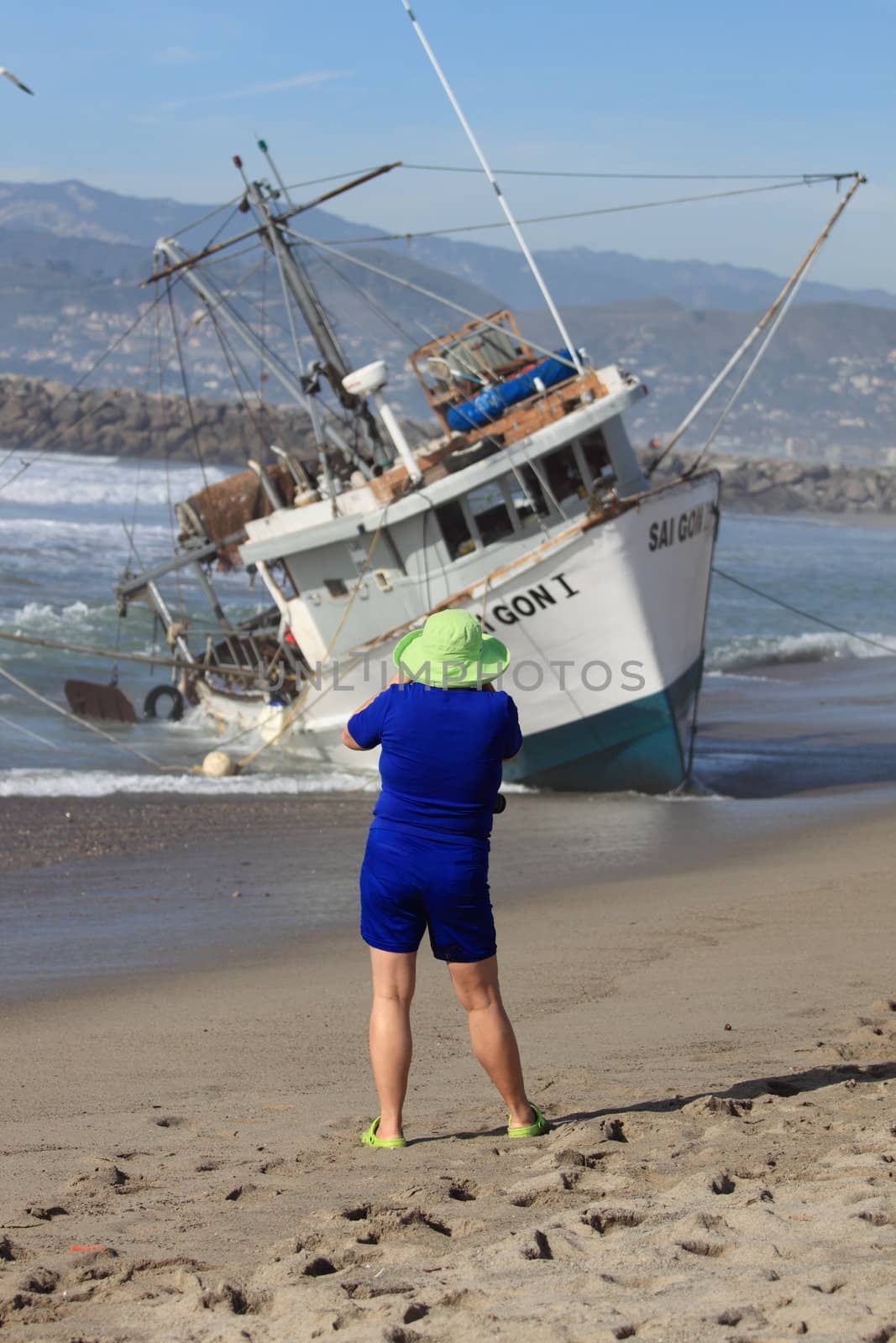 VENTURA, CA, USA - January 8, 2010 - The fishing boat SAI GON I ran aground after 4 people were rescued early morning. The rescue team tried to free the boat throughout the day January 8, 2010 in Ventura, CA