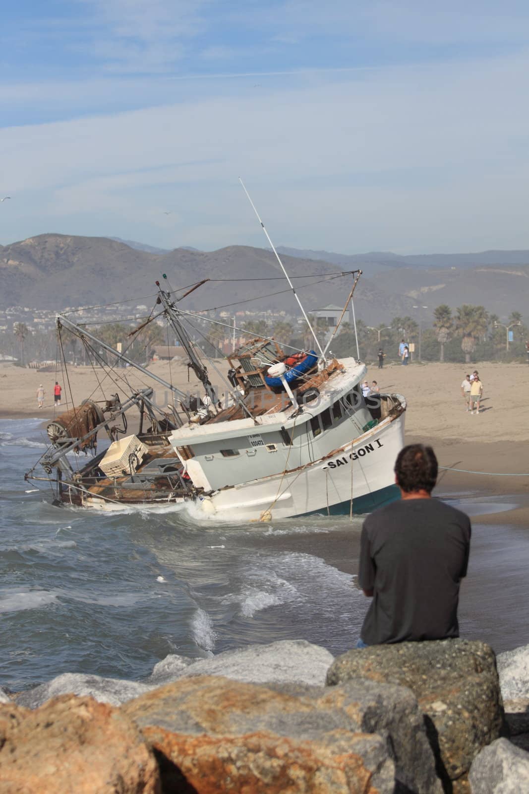 VENTURA, CA, USA - January 8, 2010 - The fishing boat SAI GON I ran aground after 4 people were rescued early morning. The rescue team tried to free the boat throughout the day January 8, 2010 in Ventura, CA