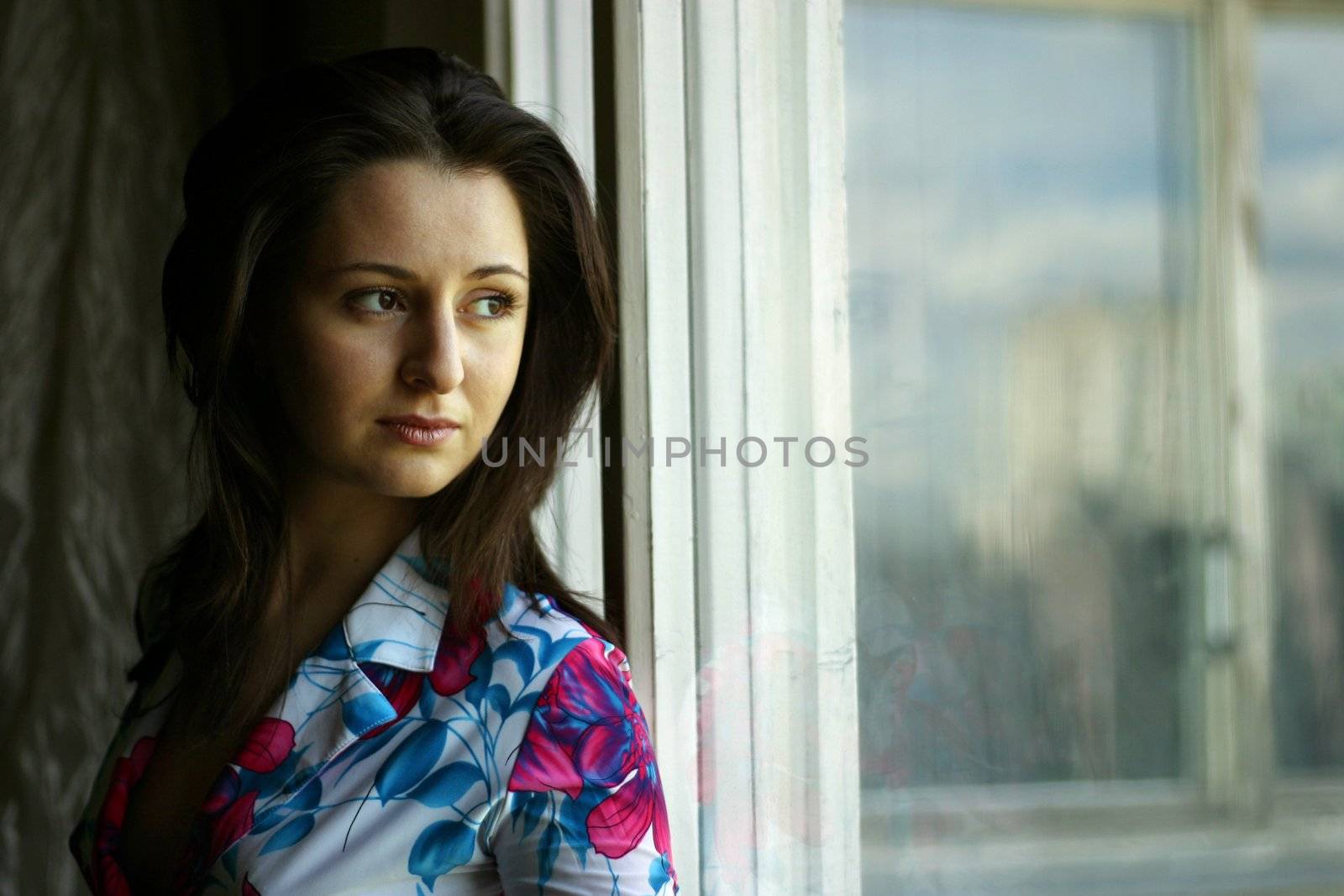 The girl looking out of the window