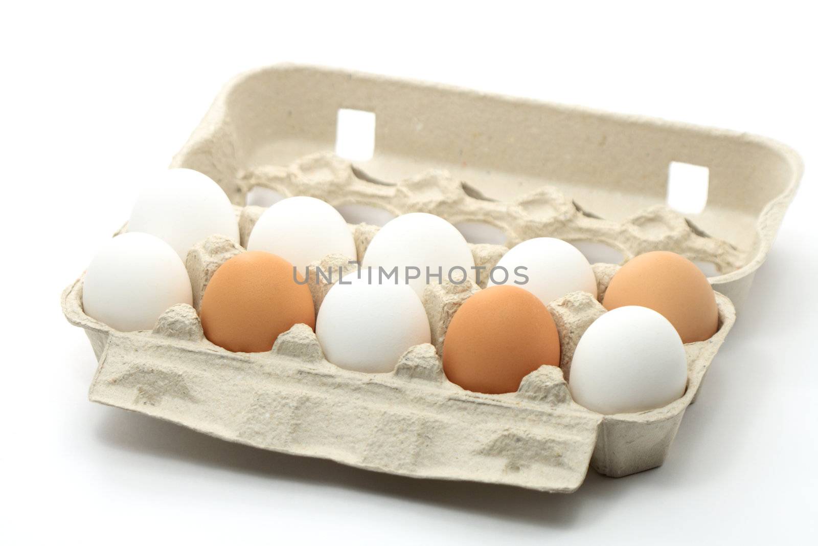 Open carton box with ten eggs isolated on white background