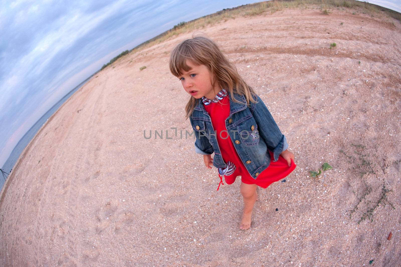 people series: little girl are wolk on sea sand