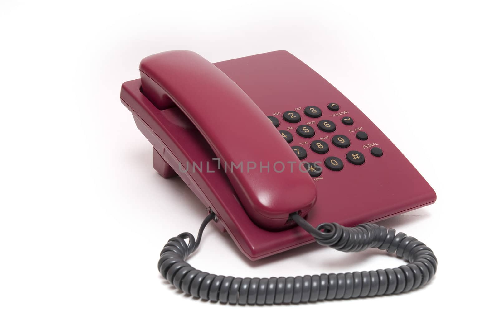 Traditional red phone isolated on white background