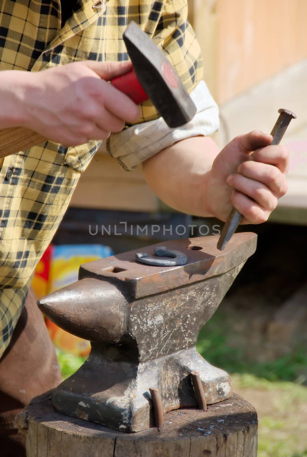 blacksmith making horseshoes