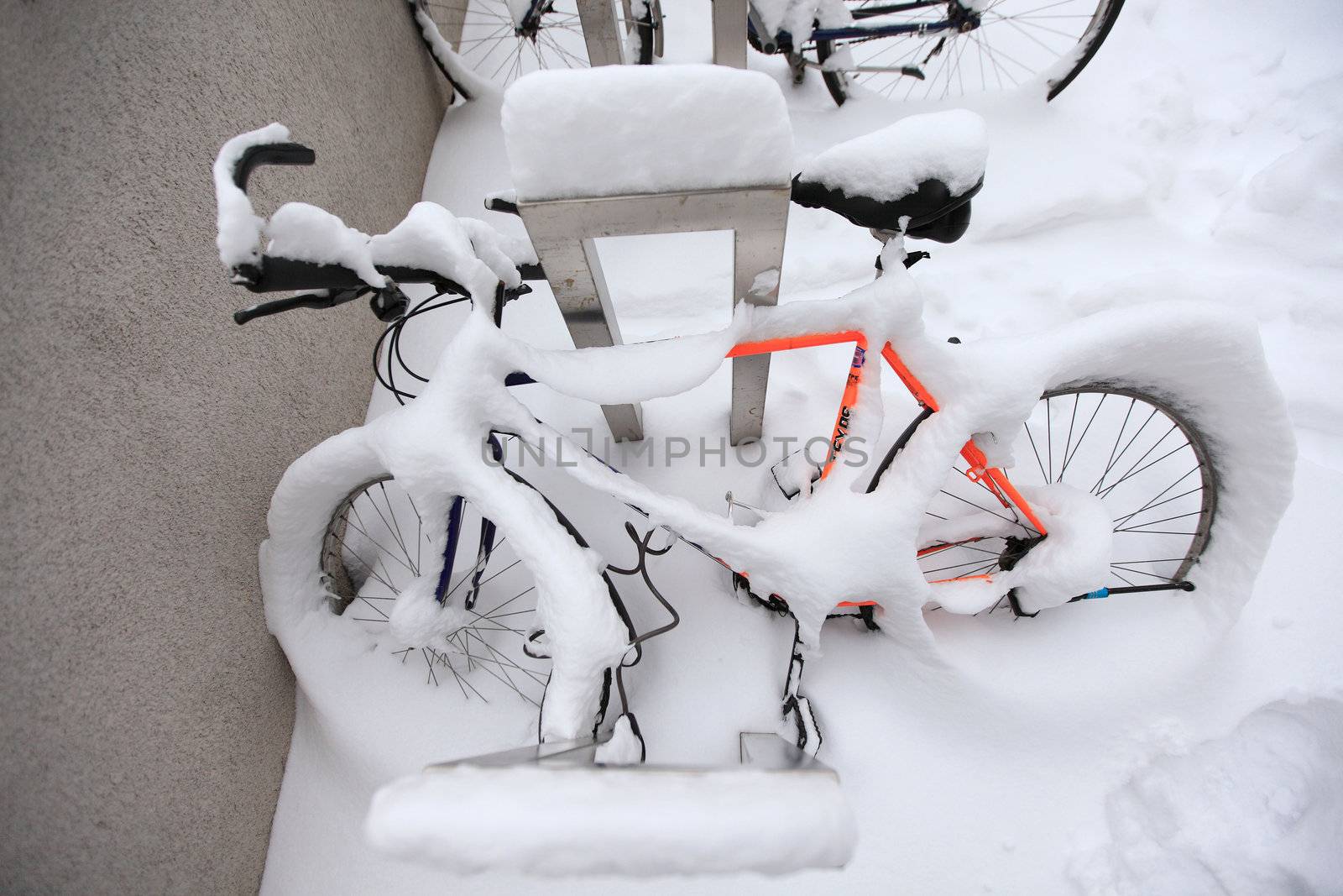 a mountainbike covered under a lot of snow