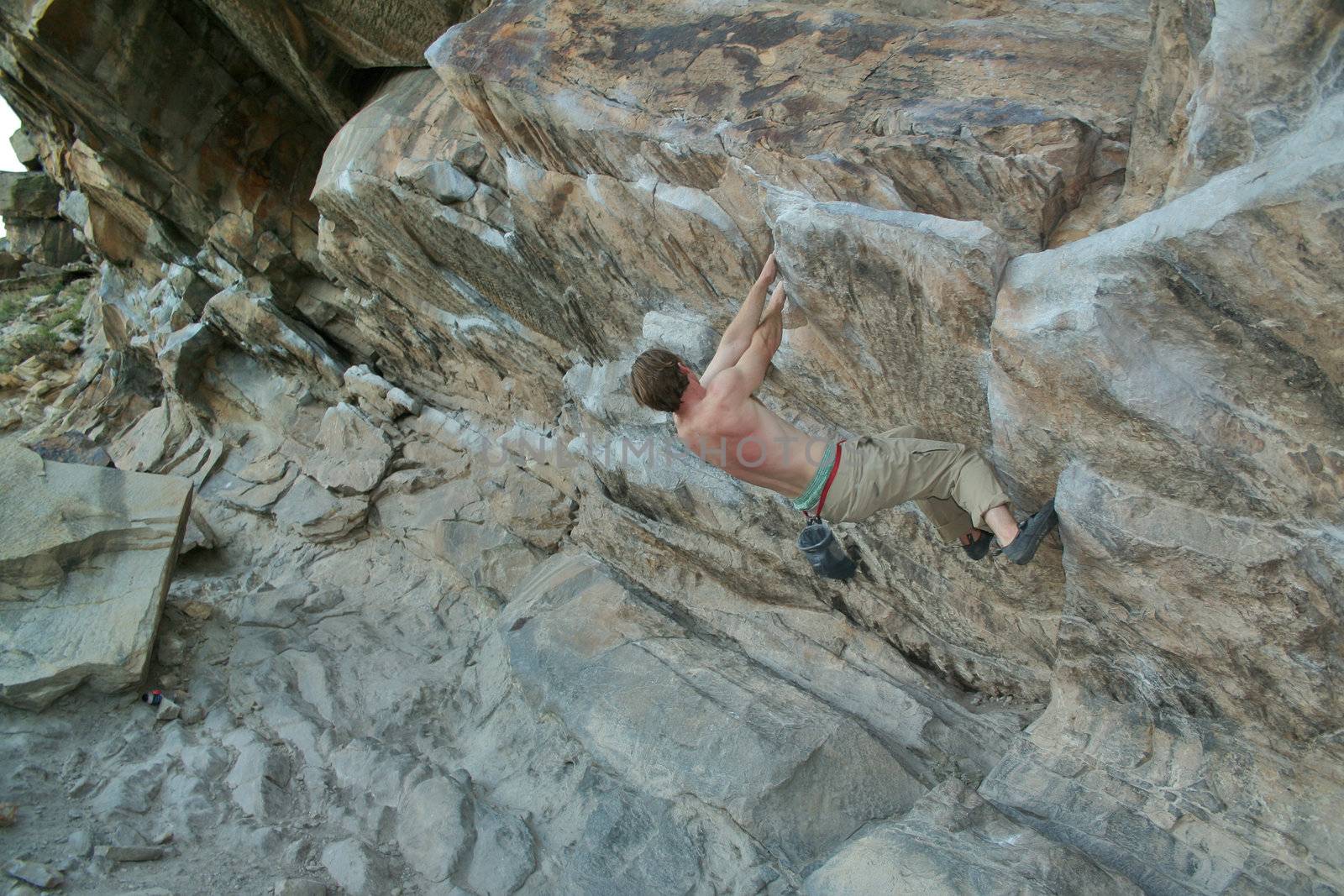 rock climber scalling a wall