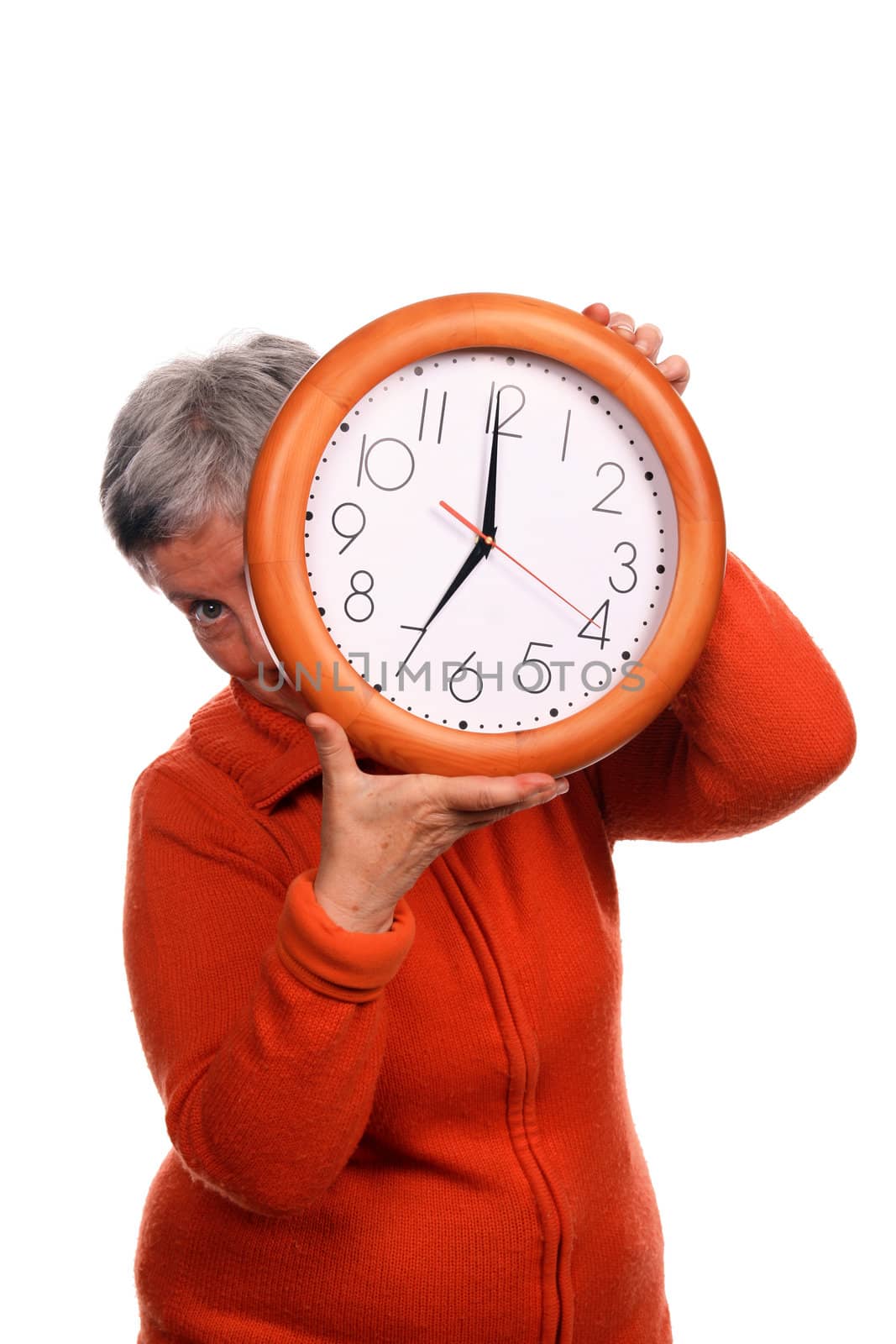 mature woman with clock over white background