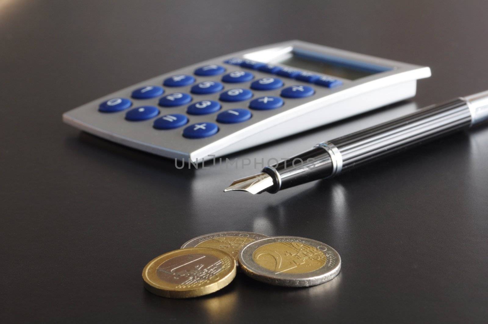 money and calculator showing banking accounting or savings concept