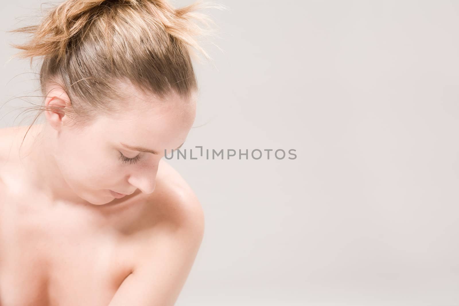 Studio close up portrait of a beautiful woman