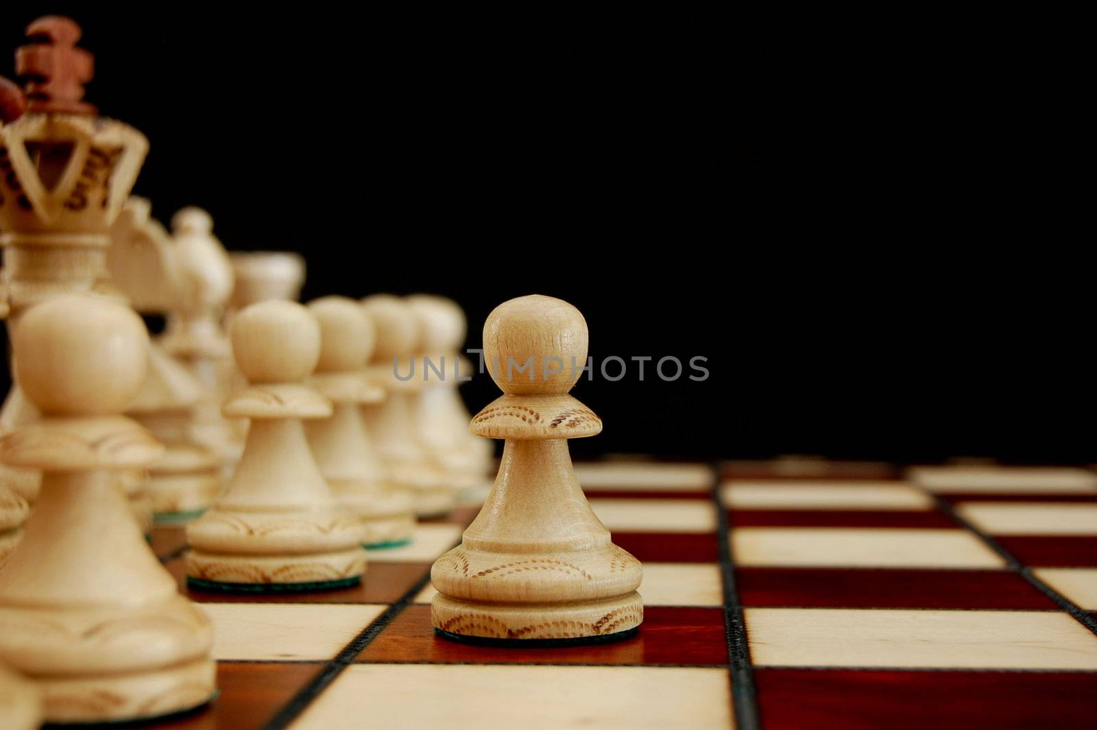 chess pieces showing concept of conflict power and success