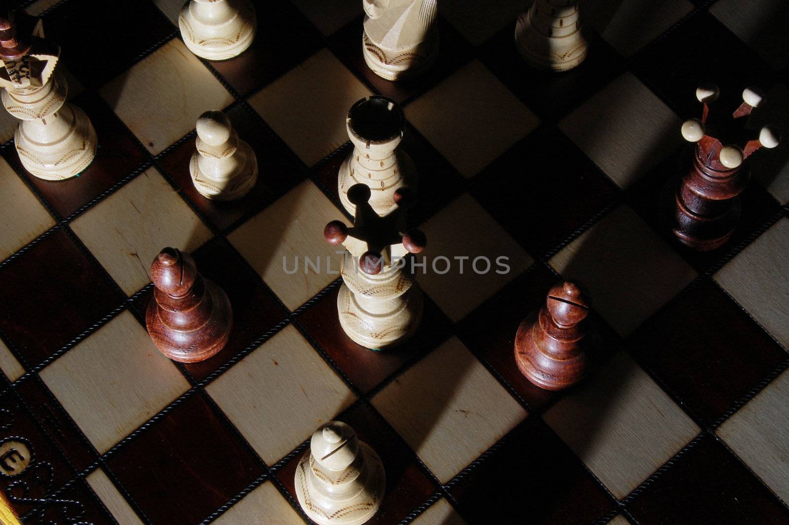 chess pieces on chess board showing power and success