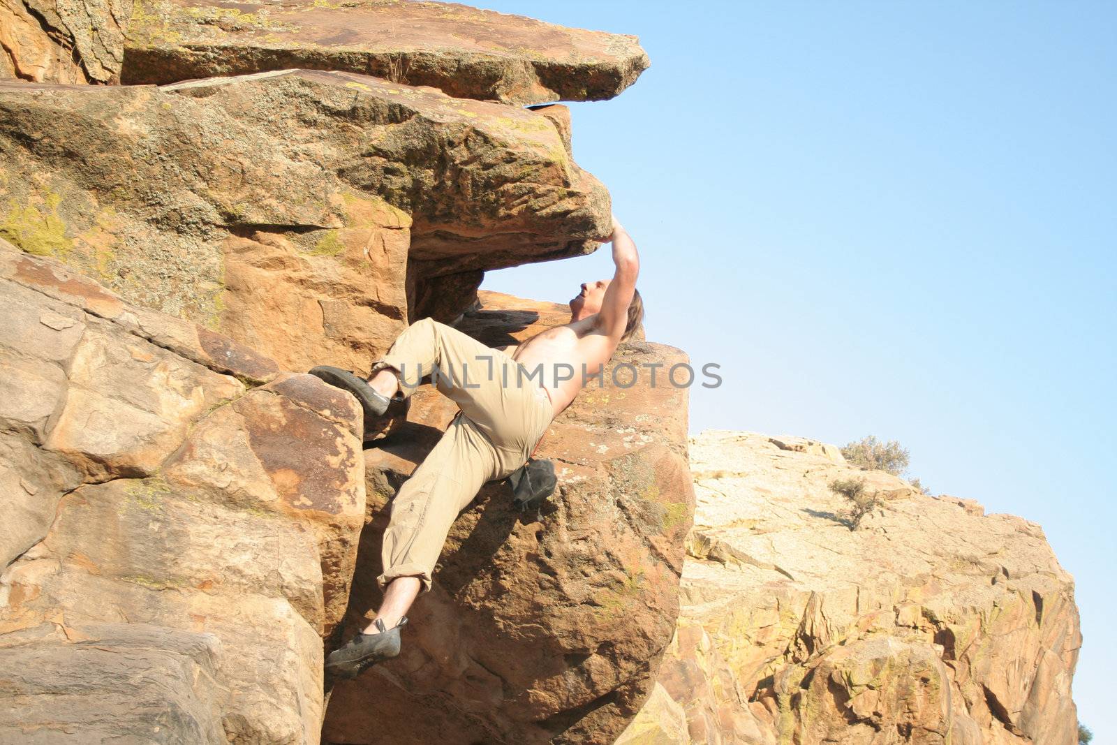 rock climber scalling a wall