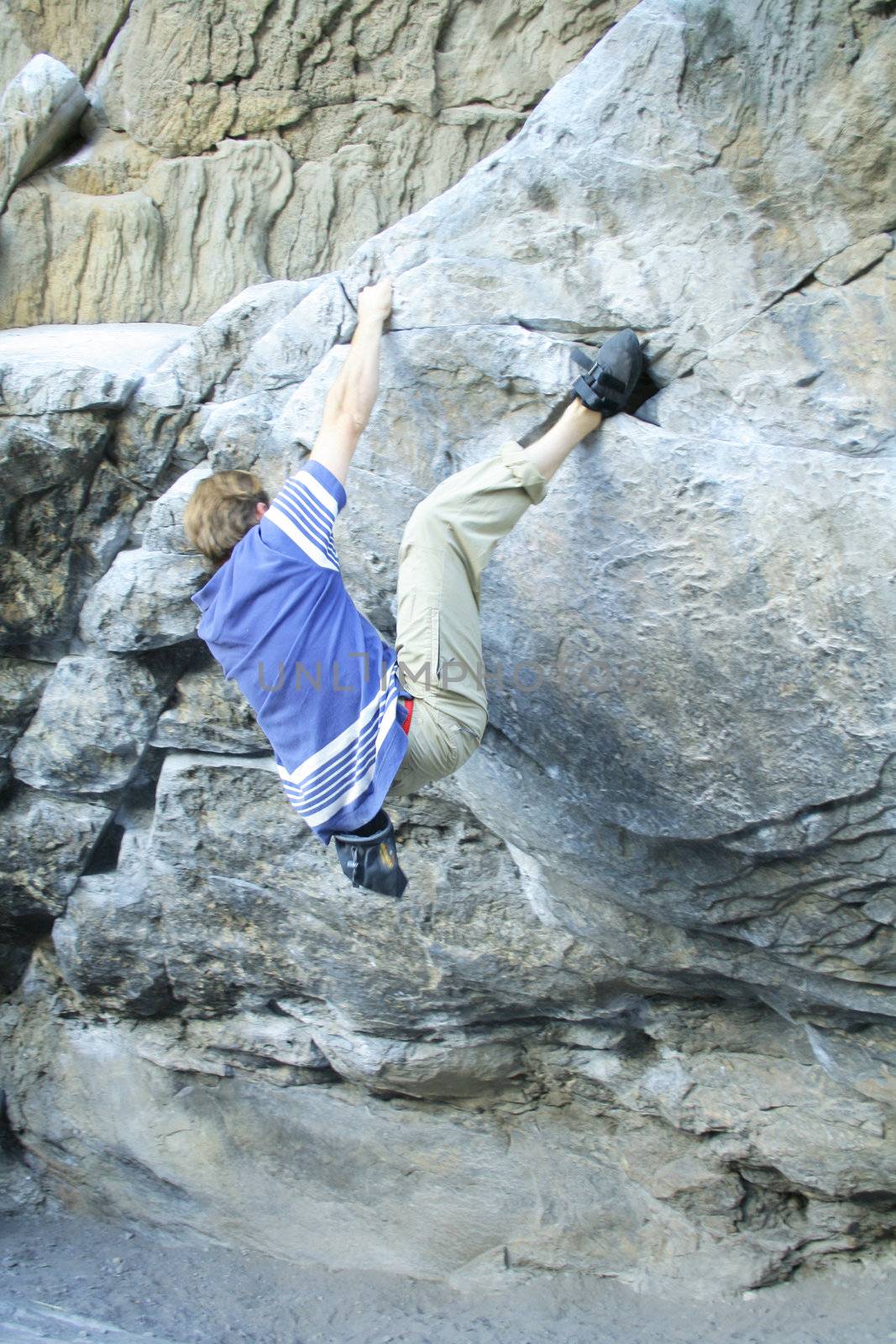 rock climber scalling a wall