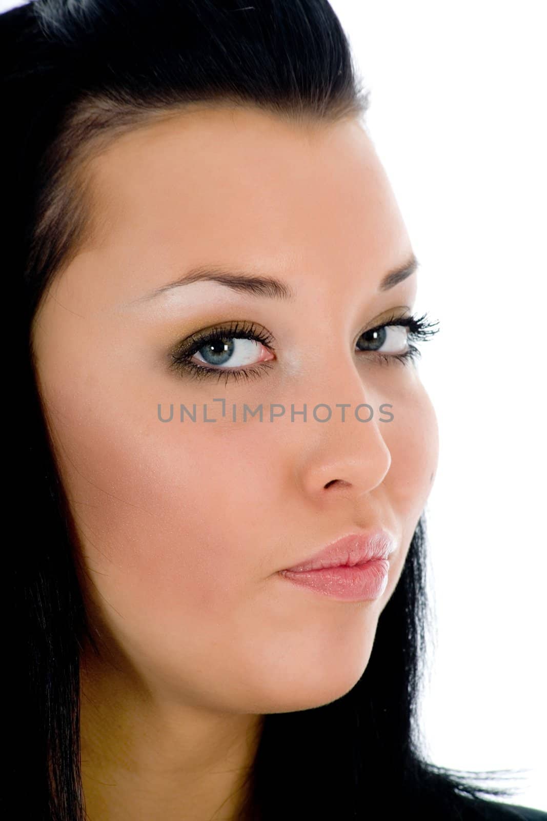 portrait of the brunette with blue eye on white background