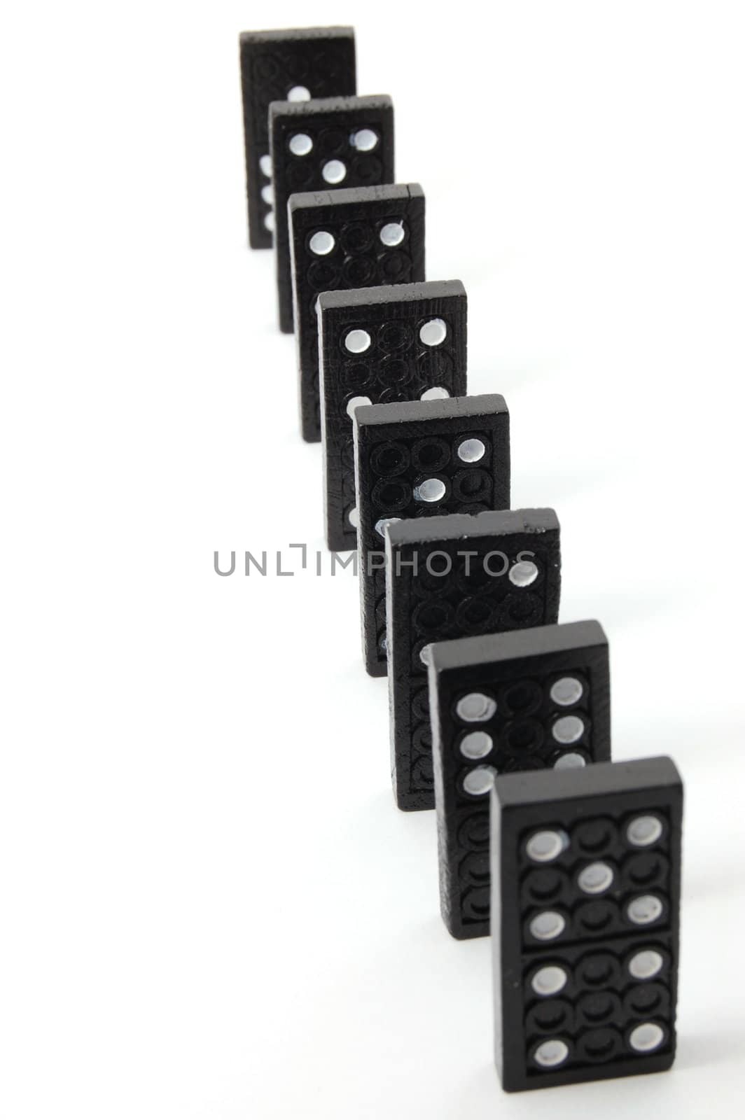 chain of dominoes isolated on a white background