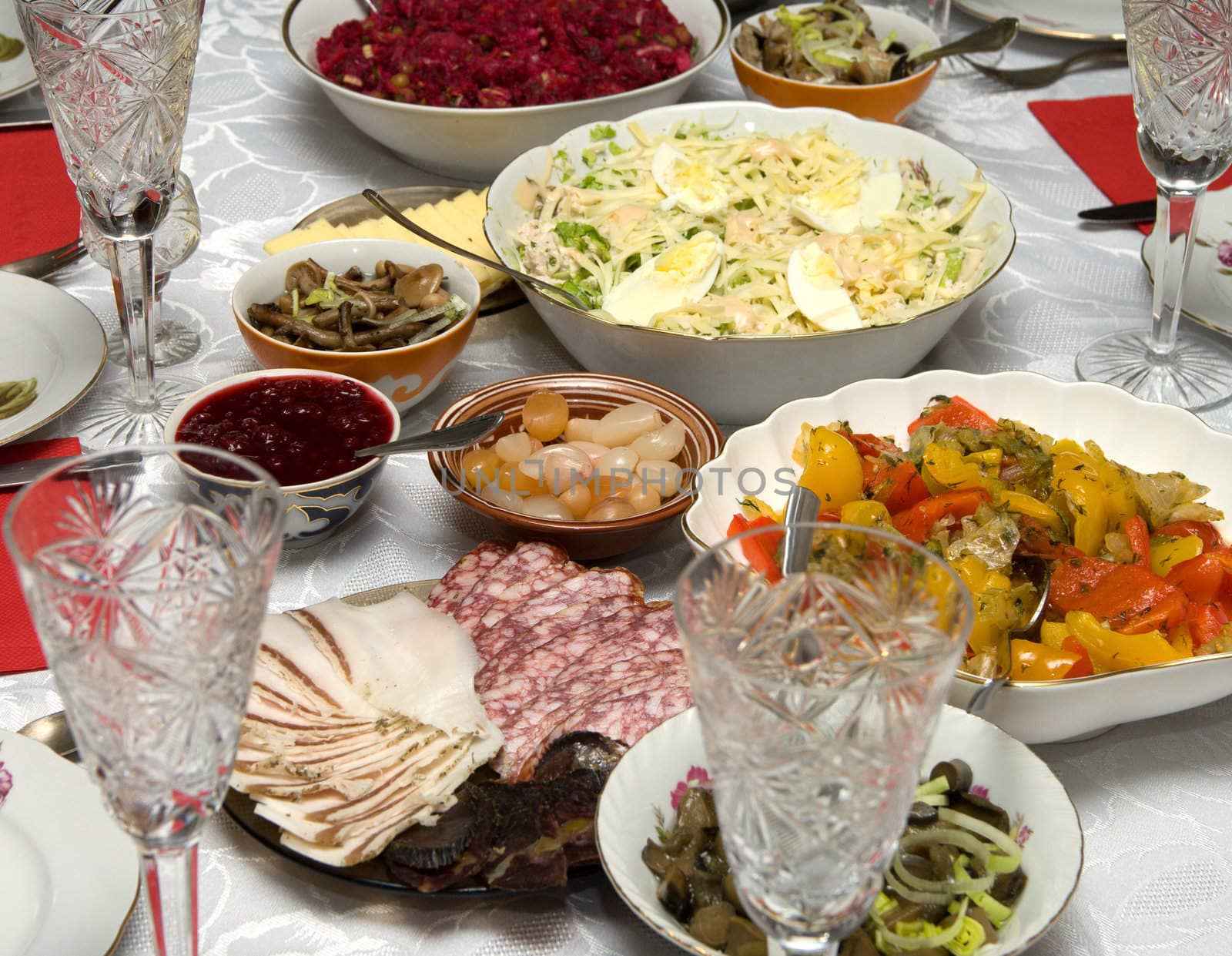 Celebratory table forced by various meal and snack.