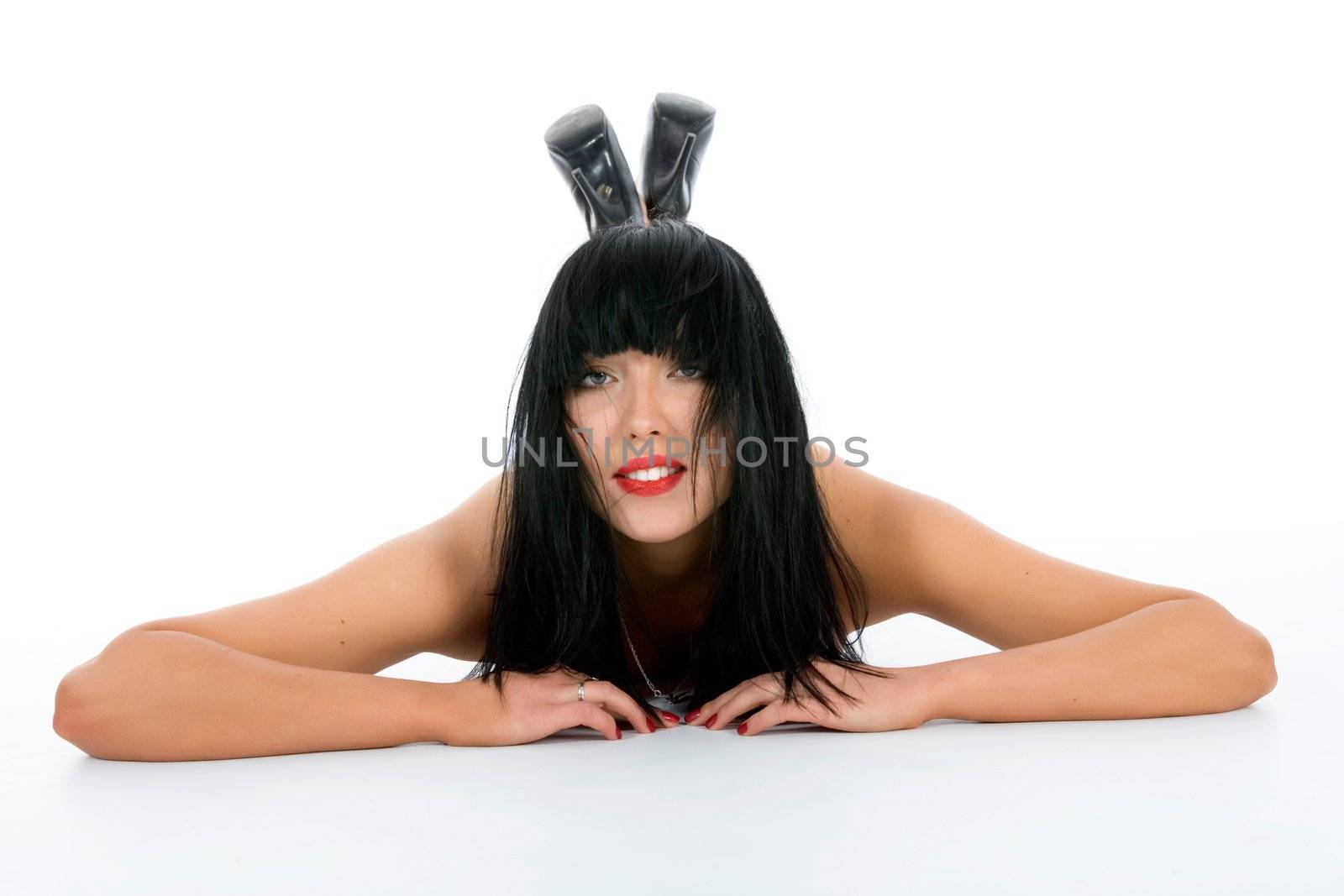 portrait of the brunette with blue eye on white background