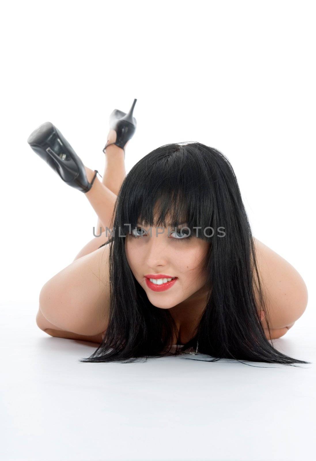 portrait of the brunette with blue eye on white background