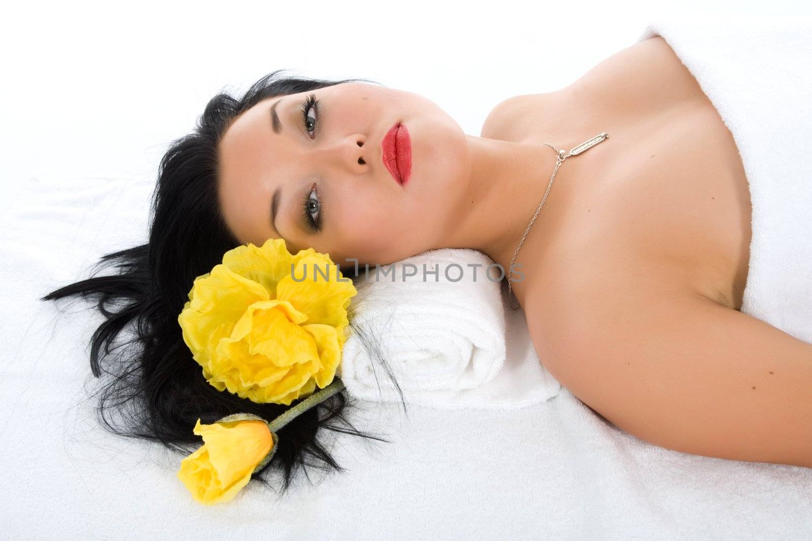 Attractive woman getting spa treatment on white