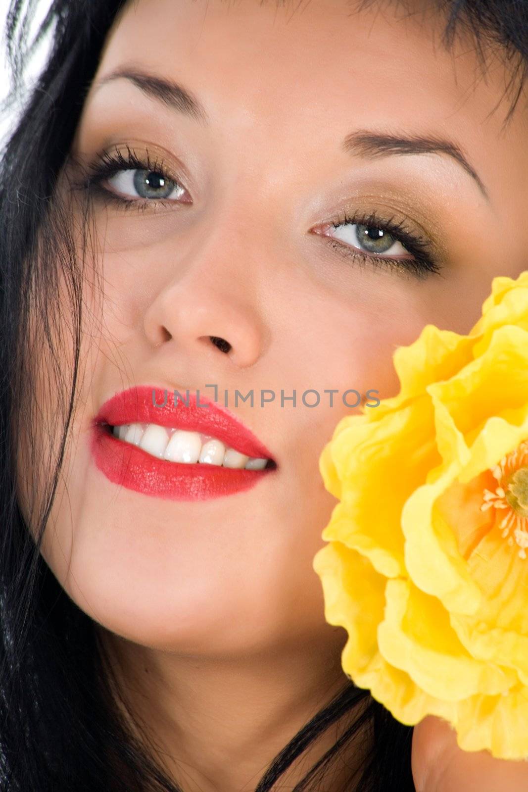 portrait of the brunette with blue eye on white background