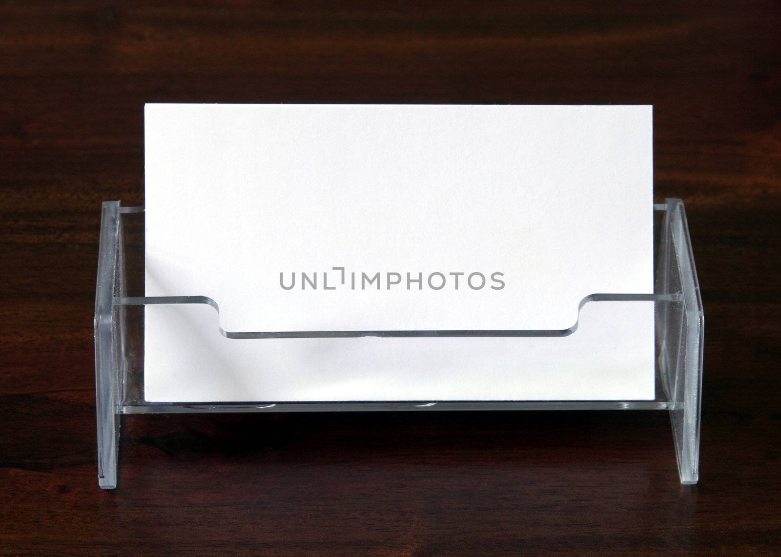 Blank Business Cards In Transparent Card Holder On Dark Wood Table