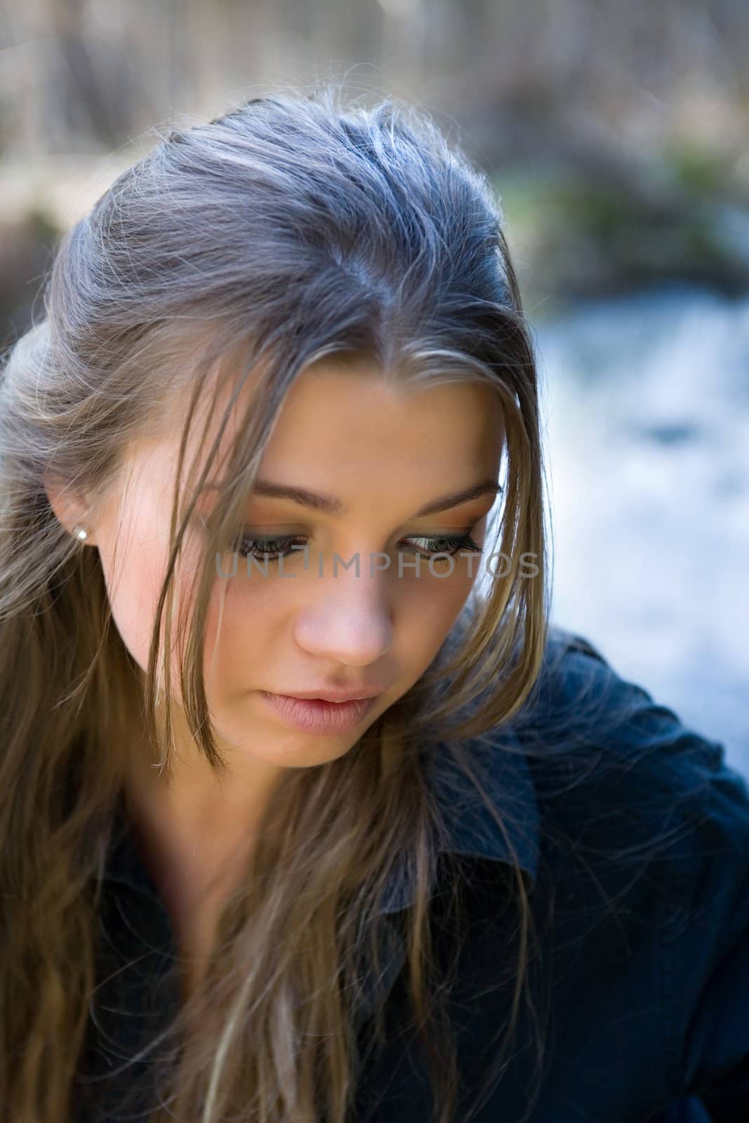 Portrait of young girl on forest background