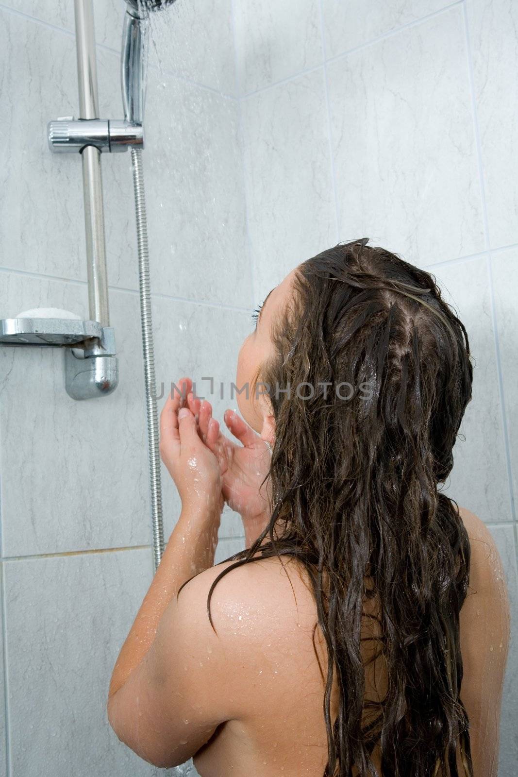 Young girl take shower
