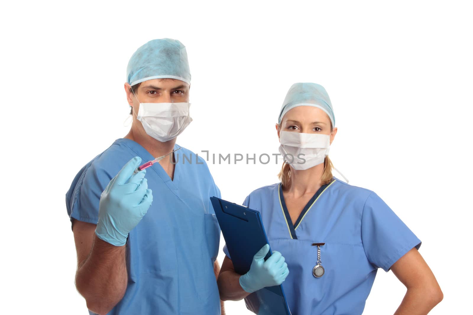 Male and female hospital medical staff standing together in scrubs uniform