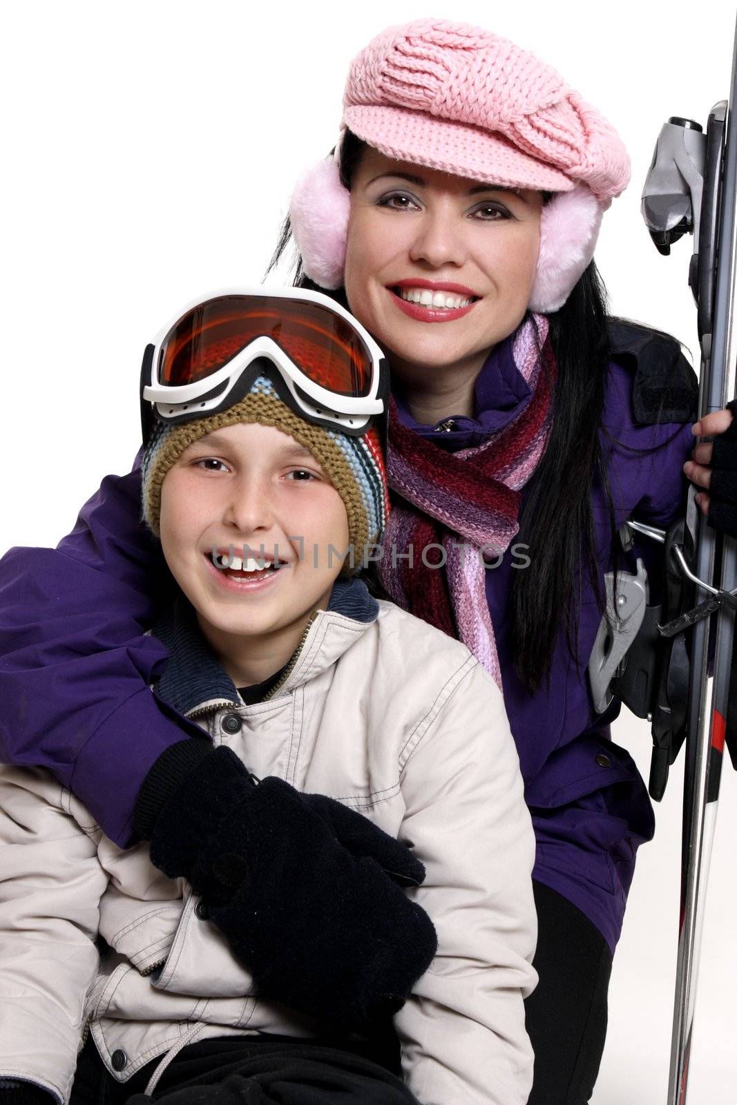 Smiling people in winter ski gear