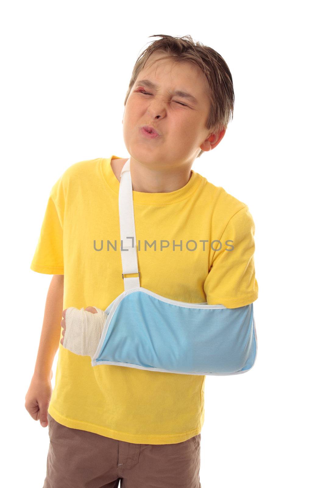 Boy wincing at painful injuries.