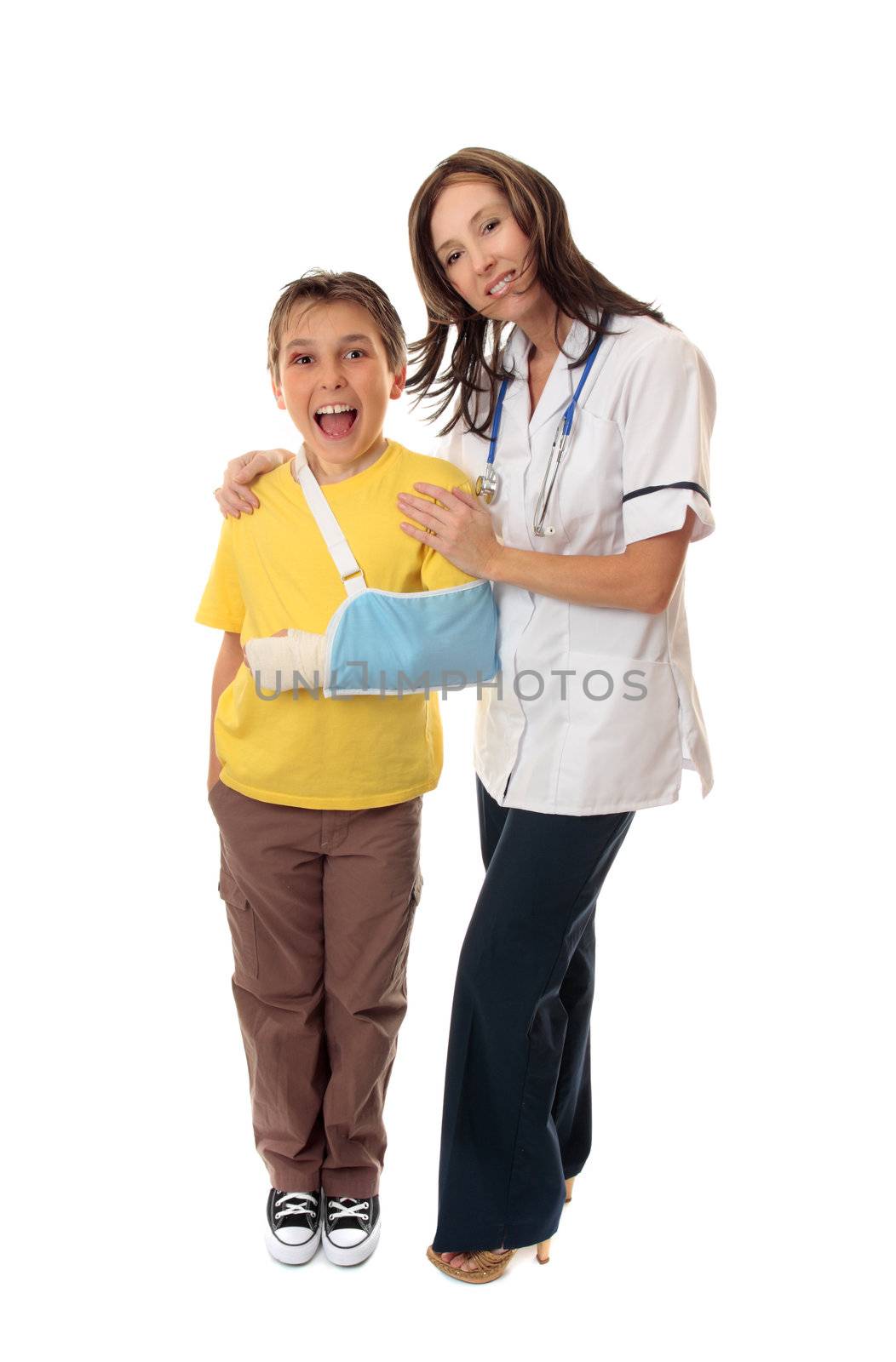 Nurse stands with a happy young  patient after being treated for injuries.