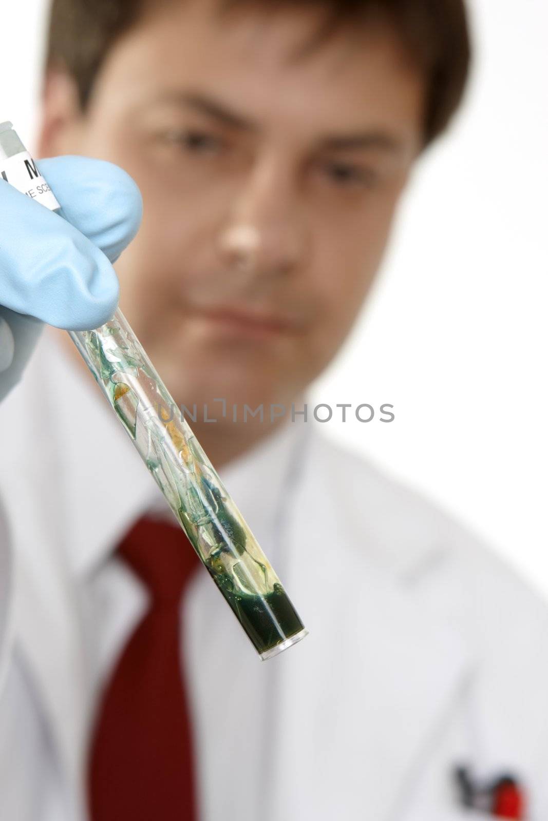 A  swab containing suspected blood  is mixed with a two vials.   If blood is present on the swab the solutions will immediately turn a blue green as shown here. (Leucomalachite green test aka LMG)