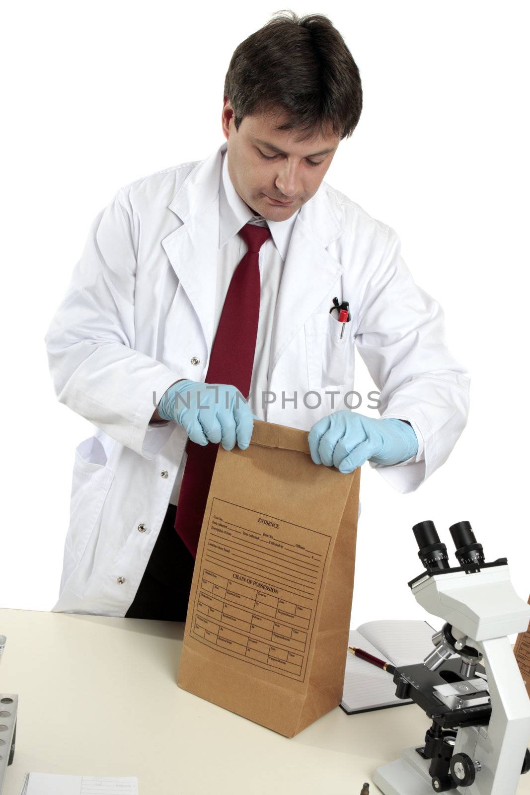 A scientist with a crime scene evidence bag