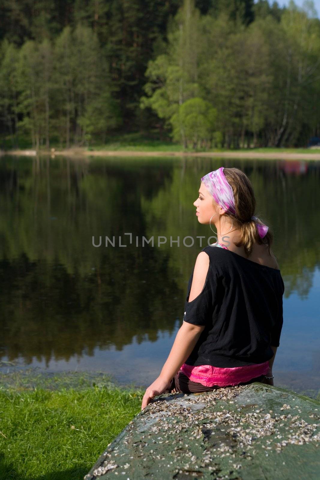  Portrait of young sexual girl on lake background
