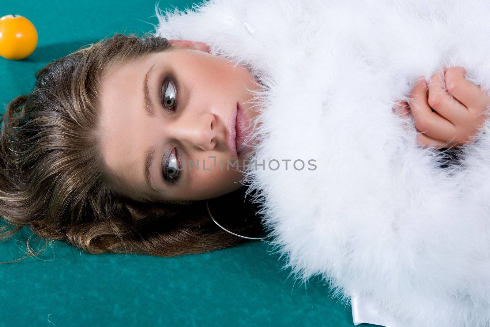 Young girl on snooker table