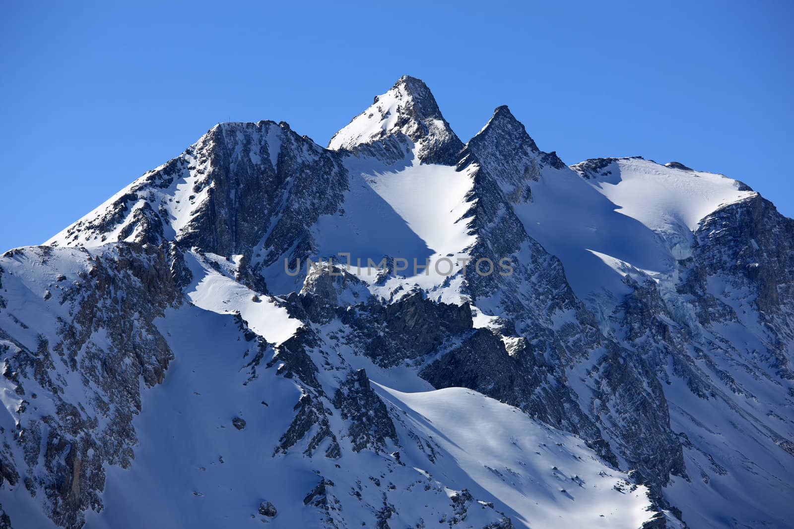 Panoramic view of swiss mountains covered with snow