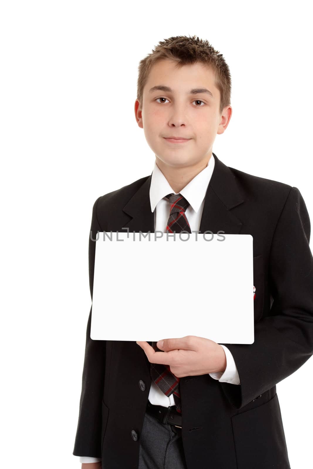 School student in uniform holding a blank sign.