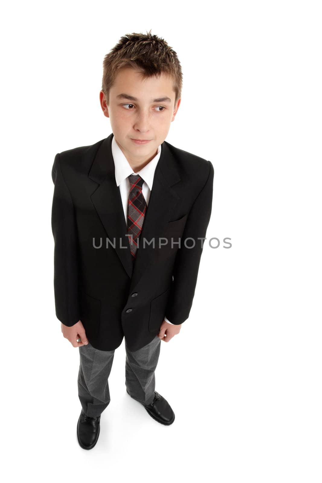 Secondary school student looking sideways - with copyspace, shadow left under feet.