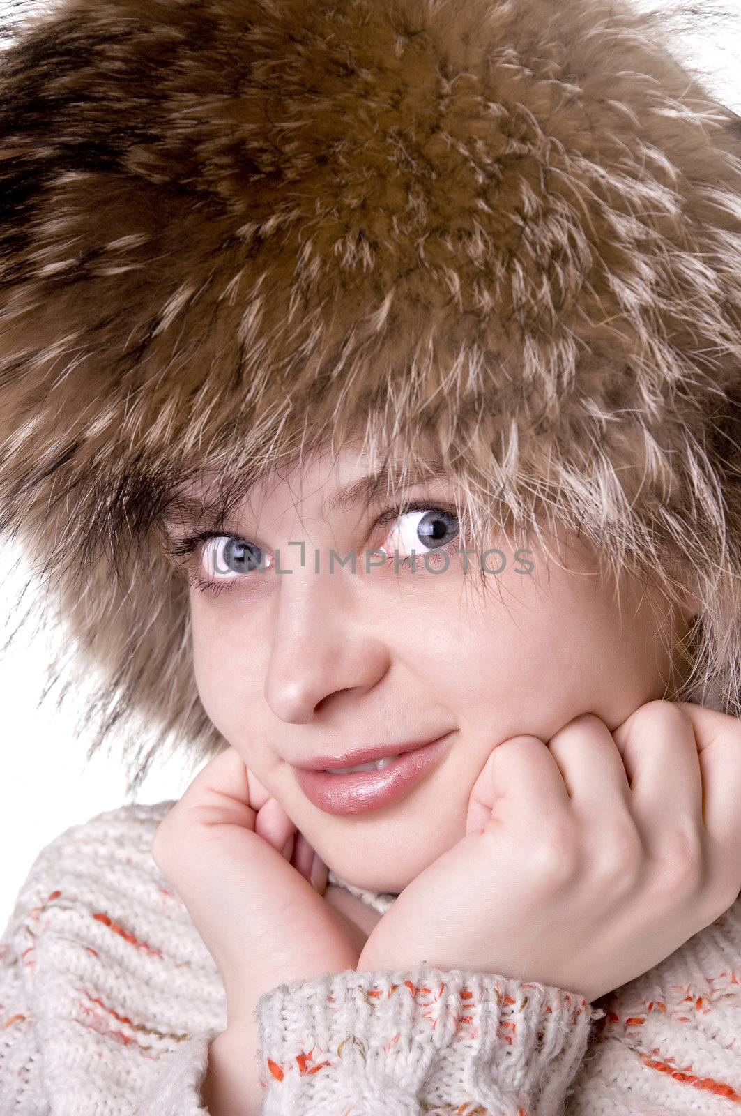 Beautiful pretty woman smilling wearing in fur hat