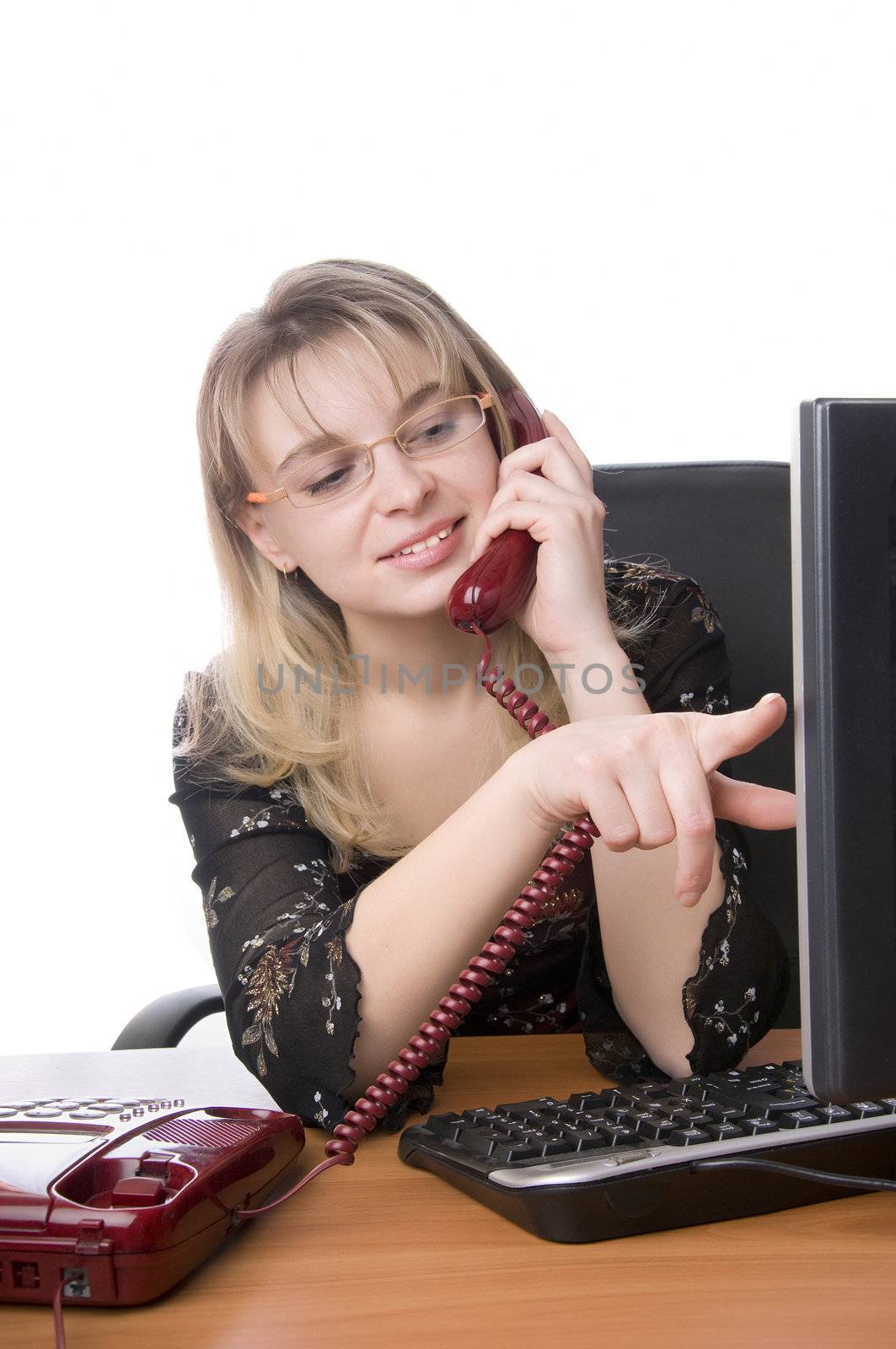 Beautiful romantic secretary businesswoman in her office with phone 