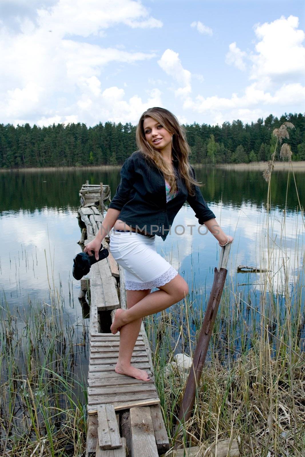  Portrait of young sexual girl on lake background